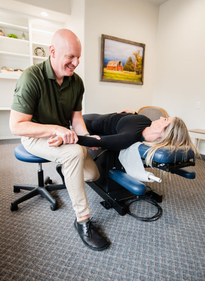 Dr. Ward helping a patient with chiropractic services in Twin Falls